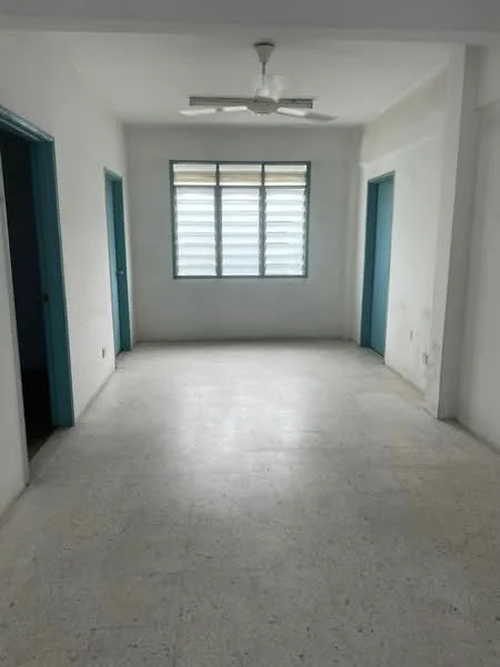 Room features: white painted walls, ceiling fan, sliding windows with horizontal slats, light-colored flooring, two doorways leading to other rooms, natural light from windows.