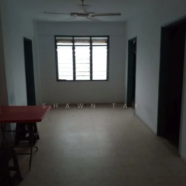 Room features: white painted walls, plain ceiling, ceiling fan, flooring with light-colored tiles, large window with multiple panes, two doorways leading to other rooms, red table, minimal decor; style: minimalist.