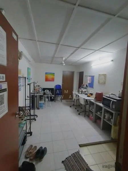 Room features: white painted walls, tile flooring, drop ceiling, ceiling fan, work tables, metal shelving units, artwork on walls, blue plastic chairs, doorway leading to another room, sliding door, area rug, open space layout; style: modern.