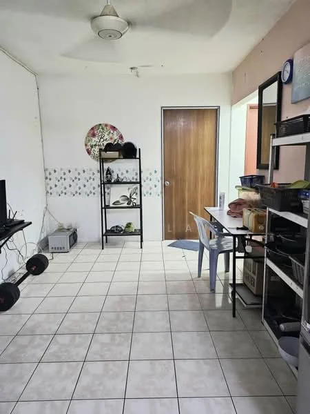 Room features: white painted walls, tile flooring, ceiling fan, wooden door, open shelving unit, television on wall mount, exercise weights, plastic chair, storage baskets, decorative wall art; style: minimalist.