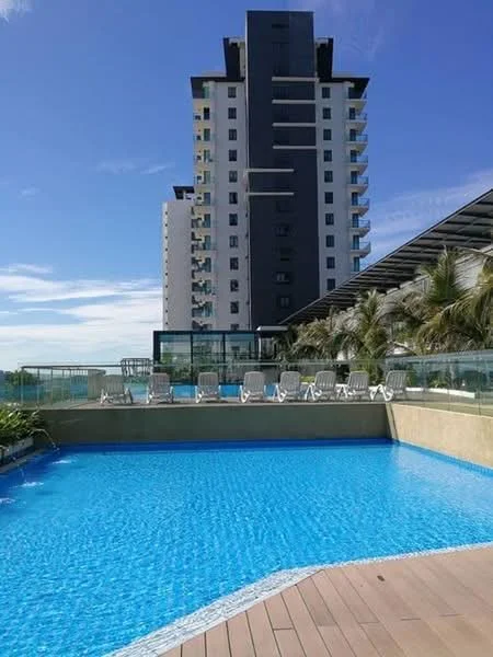 Exterior type: high-rise condominium; features: infinity pool, pool deck with loungers, glass railing, tropical landscaping with palm trees, modern architectural design, multiple storeys, sunny blue sky; style: modern.
