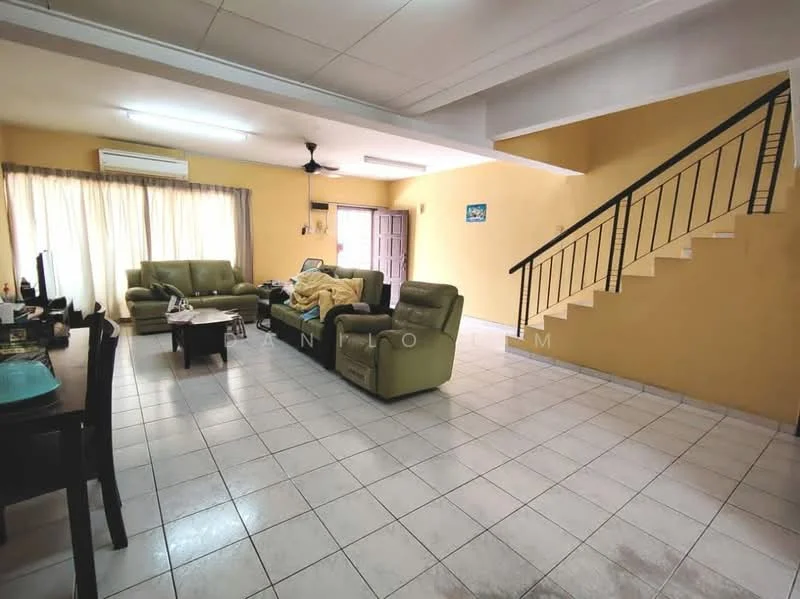 Living features: cream painted walls, white ceiling, tile flooring, 2 green leather sofas, 1 beige fabric sofa, coffee table, TV console, wall-mounted TV, 5-blade ceiling fan, curtains, staircase with metal railing.