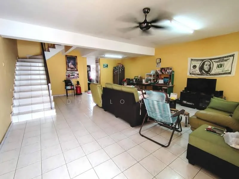 Living features: light-colored walls, white tiled flooring, 5-blade ceiling fan, L-shape sectional sofa in green, 2-seater fabric sofa in beige, coffee table, TV console, wall-mounted TV, bookshelves, decorative artwork, staircase leading to upper floor, area rug; style: modern.