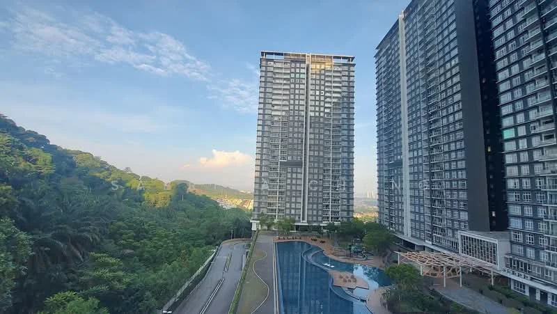 Exterior type: high-rise condominium; features: glass curtain wall, recessed balconies, infinity pool, pool deck with loungers, landscaped garden, surrounded by greenery, manicured lawn, multi-storey structure, urban context with skyline view; style: modern.