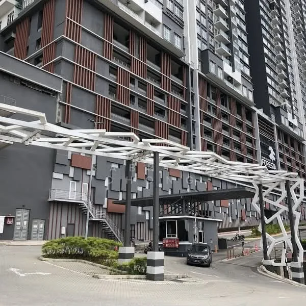 Exterior type: high-rise condominium; features: grey painted facade, wood accent panels, glass curtain wall, recessed balconies, guard house at entrance, driveway with interlocking pavers, landscaped greenery, multi-storey structure, visible parking area; style: modern.