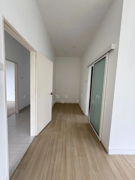 Room features: white painted walls, light wood flooring, sliding glass door, door with white frame, high ceiling, tile flooring in adjacent area, neutral color scheme, natural light from windows; style: modern.