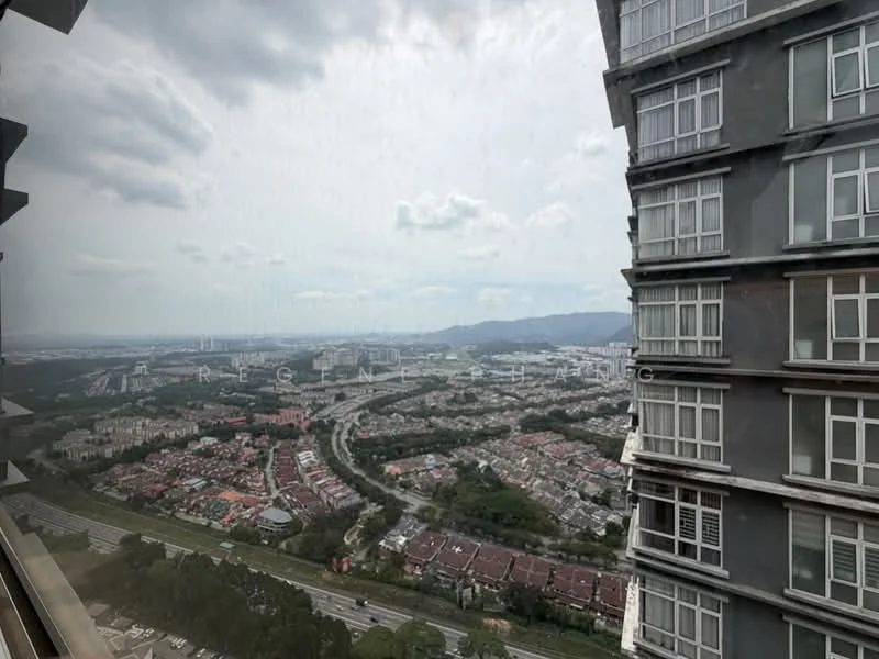 Exterior type: high-rise condominium; features: glass curtain wall, approximately 20-storey high-rise, city skyline view, surrounded by residential areas, highway visible in foreground, mountain view in background; style: modern.