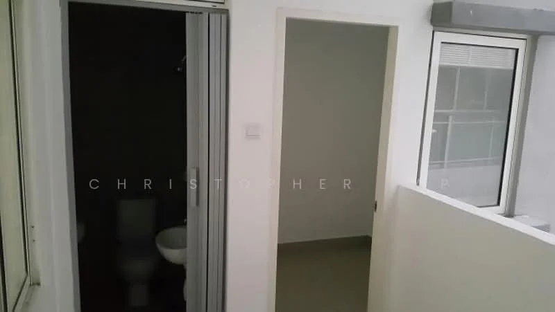 Room features: white painted walls, light grey tiled flooring, sliding glass door, window with white frame, door leading to another room, toilet visible through door.