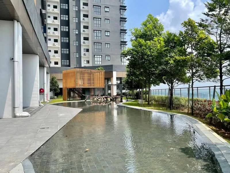 Exterior type: high-rise condominium; features: swimming pool with water feature, landscaped garden, manicured lawn, wooden deck area, paved walkway, surrounding greenery, modern facade, outdoor seating area; style: modern.
