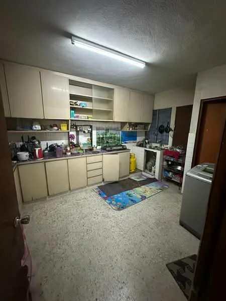 Kitchen features: light-colored cabinetry, laminate countertop, single-bowl stainless-steel sink, chrome pull-down faucet, built-in gas stove, wall-mounted kitchen shelves, tile backsplash, refrigerator, washing machine, flooring with speckled pattern, overhead fluorescent lighting, colorful area rug, various kitchen appliances, kitchen utensils and cookware.