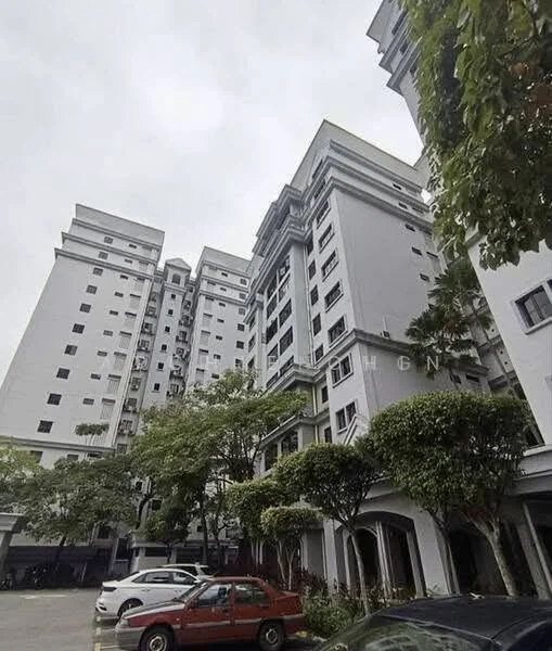 Exterior type: mid-rise condominium; features: grey painted facade, multiple storeys, balconies on upper floors, manicured landscaping, trees in front of building, parking area with cars, surrounded by greenery; style: modern.