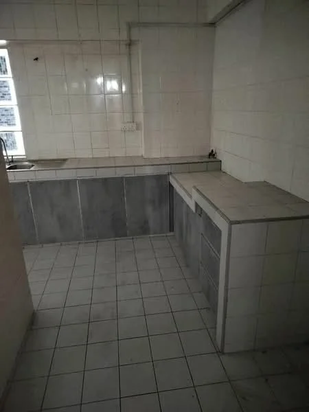 Kitchen features: white tiled walls, grey tiled backsplash, grey countertop, built-in cabinetry, single-bowl stainless-steel sink, wall-mounted faucet, ceramic tile flooring, fluorescent ceiling lights.