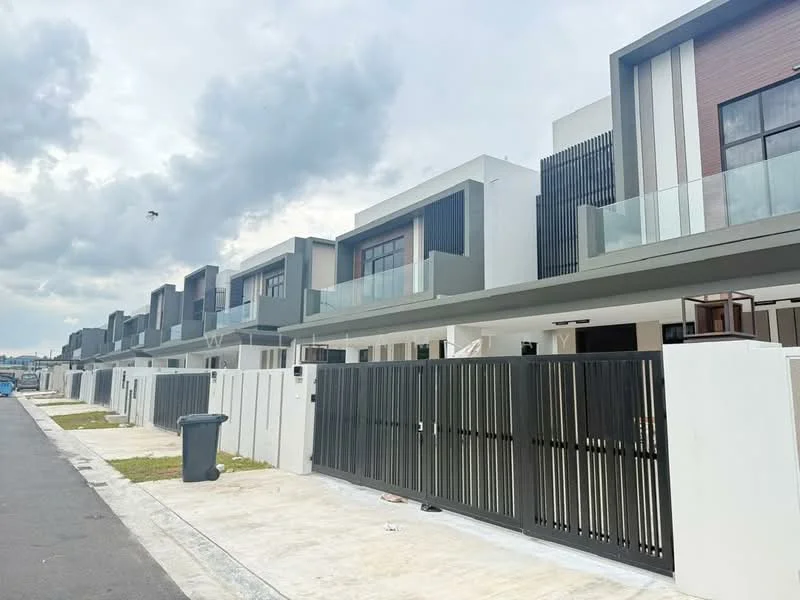Exterior type: linked terrace house; features: white painted facade, grey accent walls, glass balcony railings, flat roof, two-storey, manicured lawn, driveway with interlocking pavers, modern design, gated entry, street view, surrounded by mature greenery; style: modern.