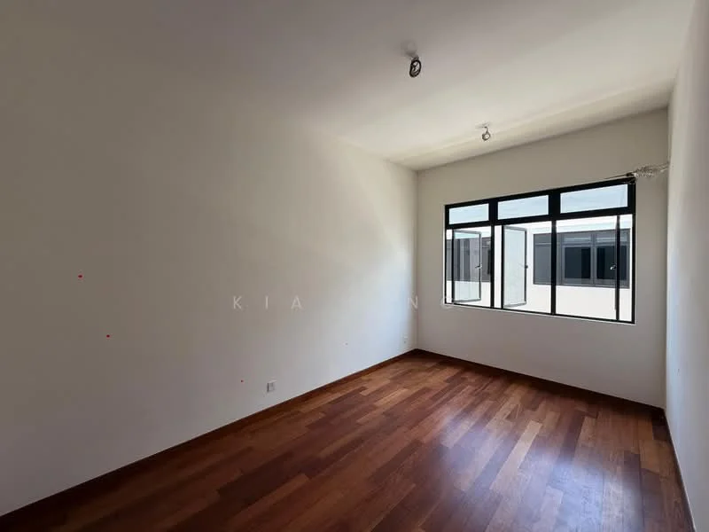 Room features: wooden flooring, white painted walls, large window with black frame, ceiling light fixture, corner of room with no visible furniture.