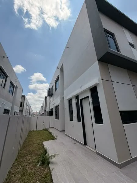 Exterior type: linked terrace house; features: white painted facade, grey accent panels, flat roof, approximately 2-storey, manicured lawn, side walkway, windows with black frames, balcony with railing; style: modern.