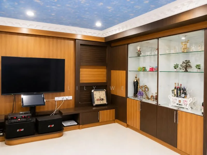 Living features: wood paneling on walls, glass display cabinet, built-in shelving, flat-screen TV, media console, cream tiled flooring, decorative items on shelves, recessed ceiling lights, blue patterned ceiling, crown moulding; style: modern.