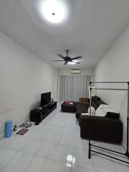 Living features: white painted walls, glossy white tile flooring, 5-blade ceiling fan with light, sofa in dark brown, coffee table, TV console, wall-mounted TV, curtains on windows, air conditioning unit, clothes rack, decorative throw pillows; style: modern.