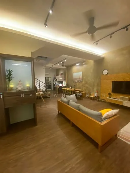 Living features: wooden flooring, exposed concrete accent wall, recessed downlights, 5-blade ceiling fan, sofa with orange and grey cushions, coffee table, TV console, wall-mounted TV, decorative wall clock, open shelving unit, artwork on wall, staircase in background; style: modern.