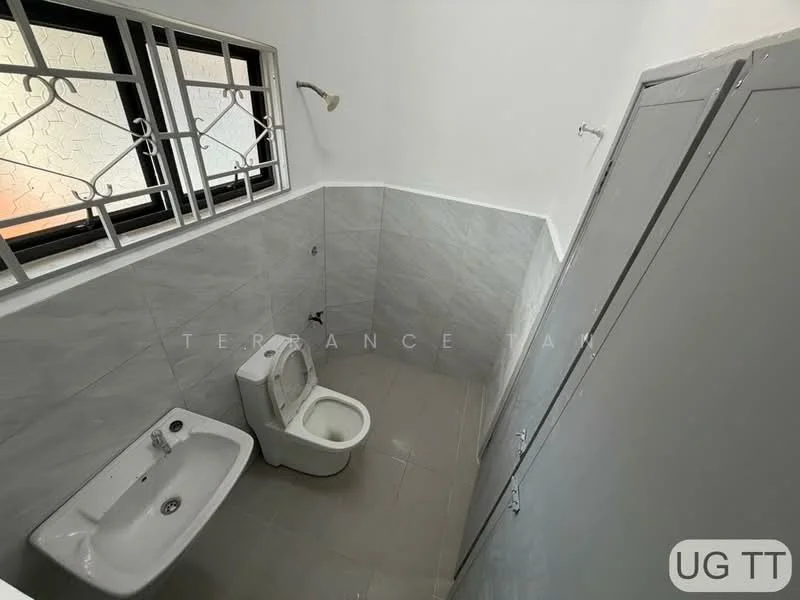 Bathroom features: white ceramic toilet, white ceramic sink, shower head, grey wall tiles, light grey floor tiles, window with security bars, built-in cabinet, mirror above sink; style: modern.