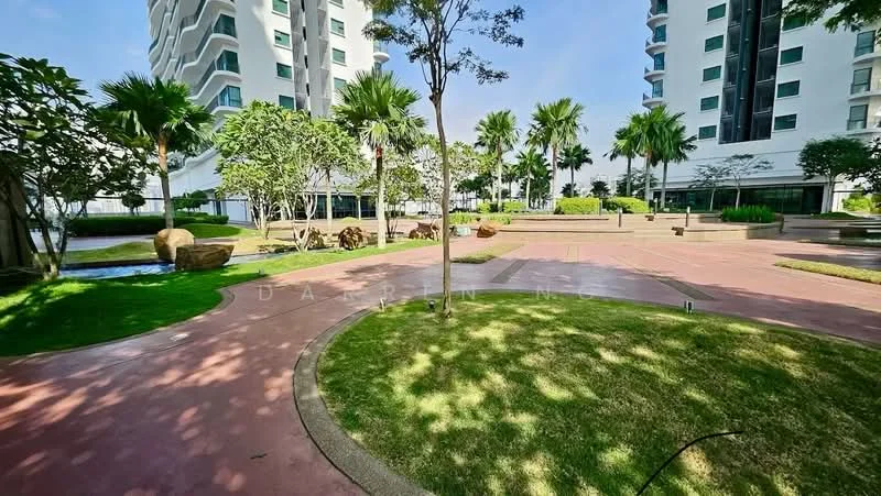 Exterior type: landscape garden; features: manicured lawn, mature palm trees, stone-paved walkway, water features, landscaped garden beds, open green spaces, modern seating areas, surrounding high-rise buildings; style: modern.