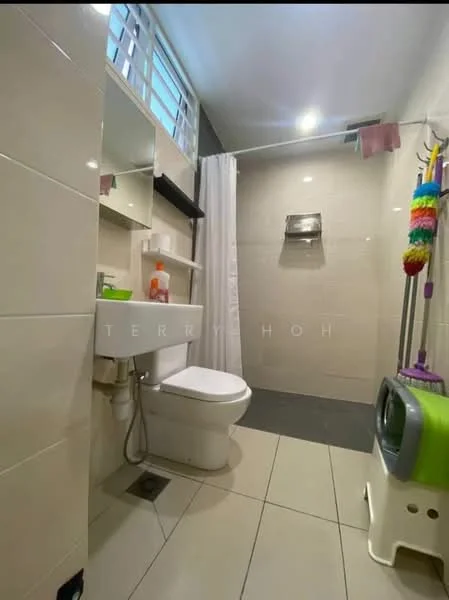 Bathroom features: white tiled walls, grey tiled flooring, single-sink vanity with under-sink storage, chrome basin mixer faucet, toilet, shower area with glass partition, shower head, shower curtain, shelf above sink, mirror above sink, cleaning supplies on the floor; style: modern.