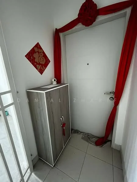 Room features: white walls, grey cabinet with red handle, ceramic tile flooring, decorative red fabric draping, red wall decoration with Chinese character, door with circular peephole, metal door handle, window with white curtains; style: modern.