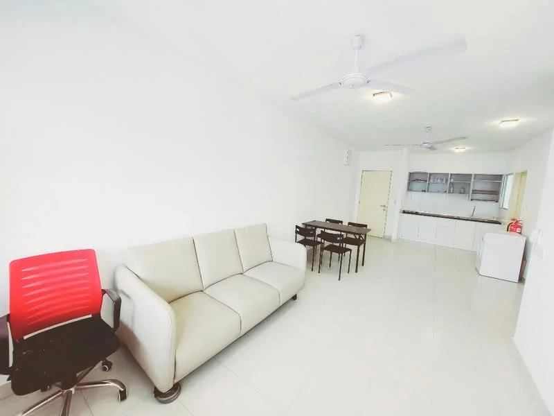 Living features: white painted walls, ceramic tile flooring, 5-blade ceiling fan with light, 3-seater fabric sofa in white, black dining table with 4 chairs, red office chair, open kitchen layout, refrigerator; style: modern.