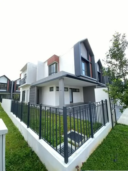 Exterior type: semi-detached house; features: white painted facade, grey accent walls, red brick accents, flat roof, manicured lawn, fenced front yard, paved walkway, multiple windows, covered porch, modern architectural design; style: modern.