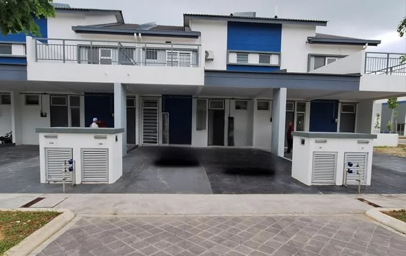 Exterior type: linked terrace house; features: two-storey building, white painted facade, blue accent panels, flat roof, covered car porch, two air conditioning units visible, paved driveway, manicured landscaping, front porch area, large windows, balcony on upper floor; style: modern.