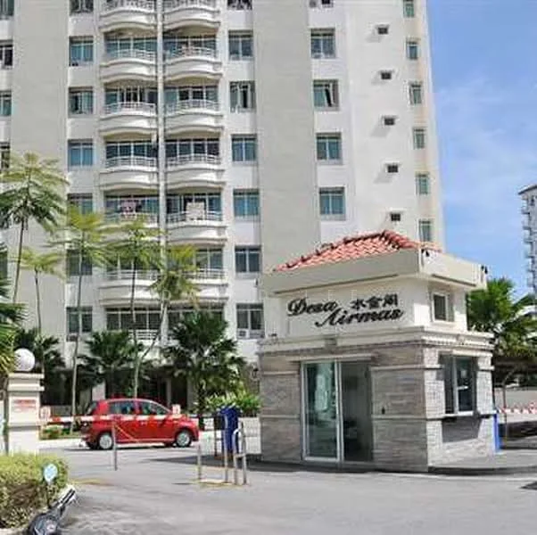 Exterior type: mid-rise condominium; features: white painted facade, recessed balconies, red tiled roof on guard house, landscaped garden with palm trees, security guard house at entrance, driveway with interlocking pavers, surrounded by mature greenery; style: modern.