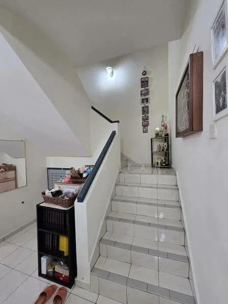 Room features: white painted walls, tile flooring, staircase with white risers, black handrail, decorative wall-mounted frames, trophies displayed on shelf, mirror on wall, shoe rack, ceiling light fixture; style: modern.