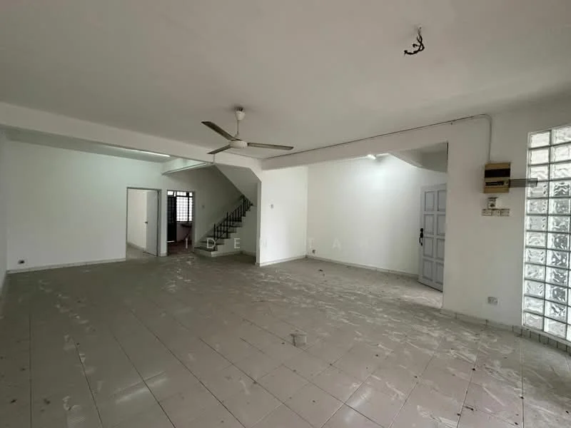 Room features: white painted walls, tile flooring, ceiling fan, staircase visible in background, glass block wall, multiple light fixtures, open layout, doorway leading to another room; style: modern.