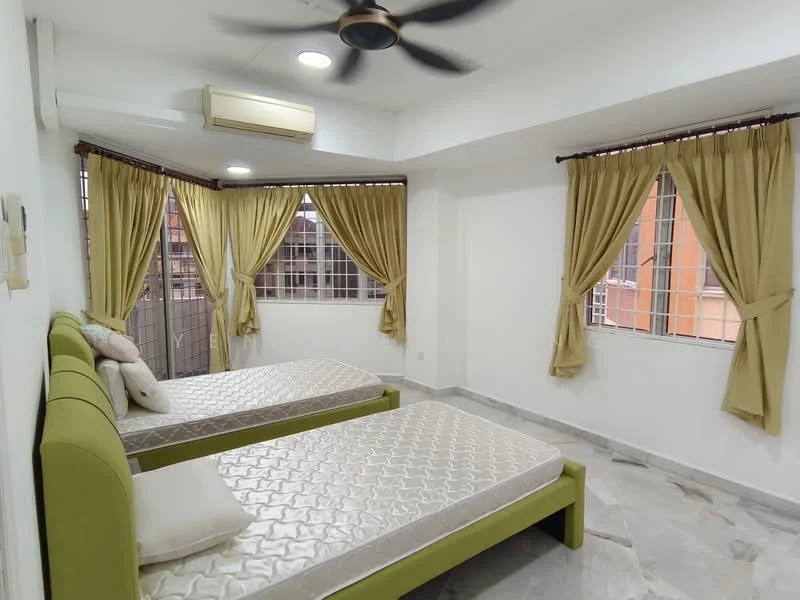 Bedroom features: two single beds, green upholstered bed frames, white mattress, white painted walls, marble flooring, ceiling fan with light, curtains in light brown, two windows with metal grills, air conditioning unit; style: modern; view: city.