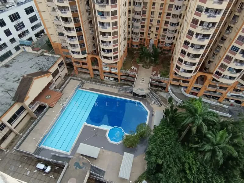 Exterior type: high-rise condominium; features: infinity pool, lap pool, pool deck with loungers, landscaped garden area, children's playground, manicured lawn, surrounding palm trees, multiple balconies on building facade, parking area visible, clubhouse, outdoor dining area; style: modern.