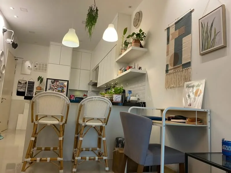 Kitchen features: white cabinetry, marble backsplash, stainless-steel sink, chrome pull-down faucet, countertop with bar seating, two rattan bar stools, open shelving, decorative wall art, pendant lighting, plant decor, white walls, polished tile flooring; style: modern.