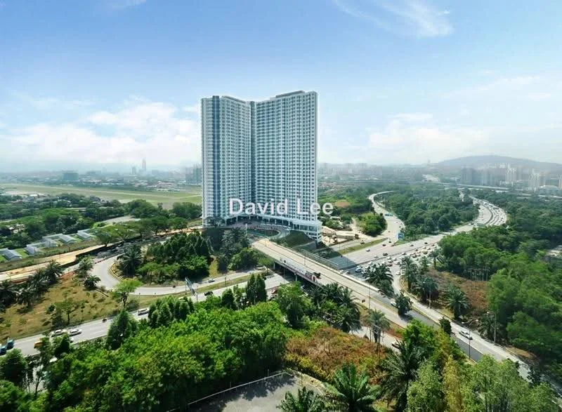 Exterior type: high-rise condominium; features: glass curtain wall, recessed balconies, surrounded by mature greenery, urban context with main road, landscaped grounds, multiple storeys, city skyline view in background; style: modern.