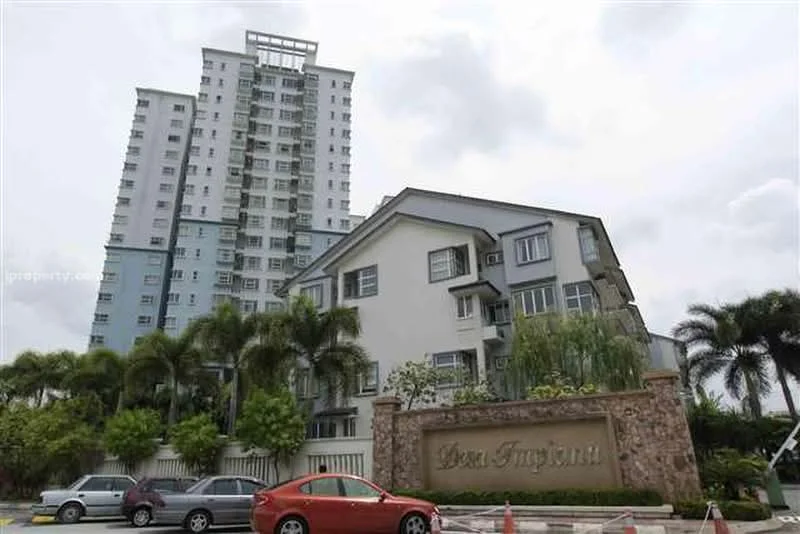 Exterior type: low-rise apartment block; features: multi-storey building, stone cladding at entrance, landscaped garden with palm trees, manicured lawn, parking lot in front, signage at entrance, surrounded by greenery; style: modern.