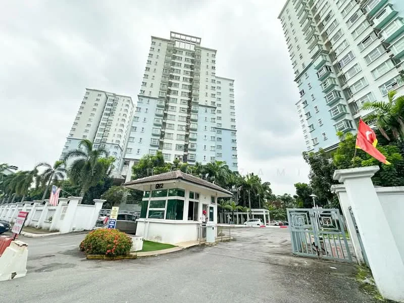 Exterior type: high-rise condominium; features: guard house at entrance, gated entry, multiple high-rise buildings, landscaped garden with shrubs, paved driveway, flagpole with national flag, security gate, surrounded by palm trees; style: modern.