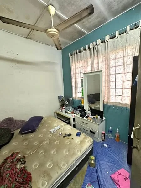 Bedroom features: queen-size bed, upholstered headboard, 3-blade ceiling fan, floor-to-ceiling window, sheer curtains, wooden dresser, mirror, cluttered surface with various items, blue carpet, painted accent wall in teal, white painted walls, decorative pillows.