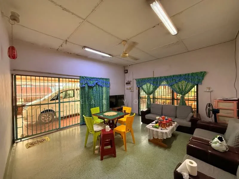 Living features: green patterned curtains, floor-to-ceiling windows with security bars, ceiling fan, recessed lighting, 2-seater leather sofa in brown, 3-seater fabric sofa in grey, coffee table, dining table with 4 chairs in various colors, decorative tablecloth, wall-mounted TV, tile flooring, painted walls in light color.
