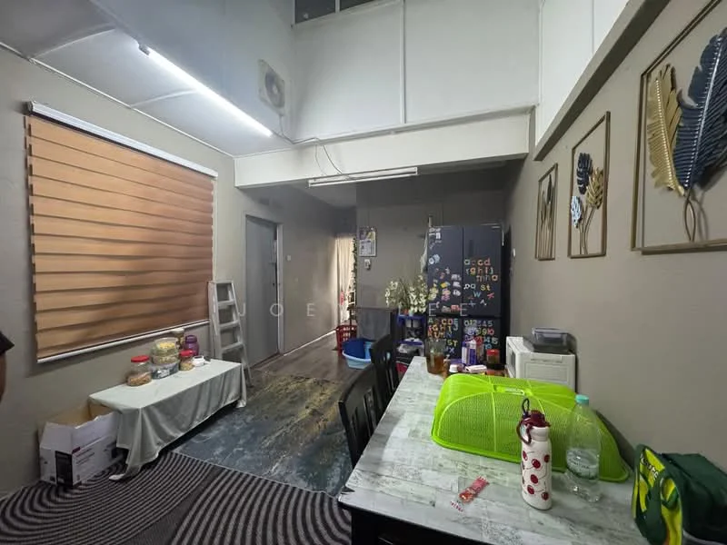 Room features: wooden flooring, beige painted walls, window with wooden blinds, black fridge, dining table with chairs, decorative wall art, shelving unit, area rug with geometric pattern, countertop with kitchen items, light fixture on ceiling; style: modern.