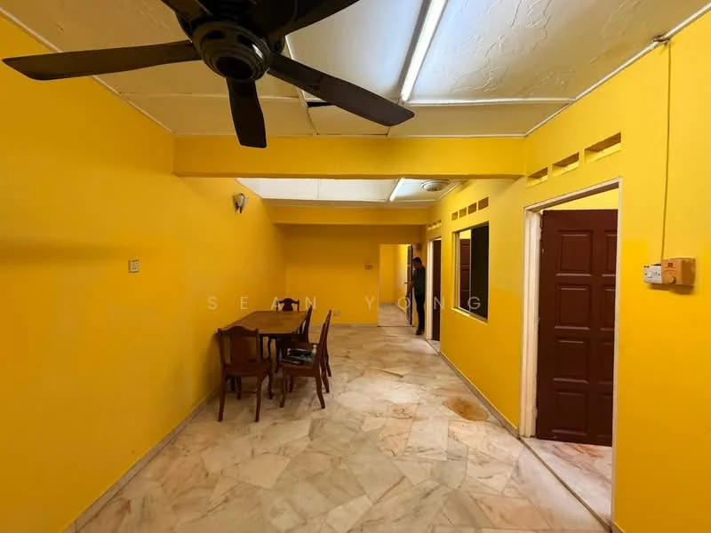 Room features: yellow painted walls, marble flooring, 5-blade ceiling fan, dining table with chairs, recessed ceiling, doorway to another room, window openings, light fixtures.