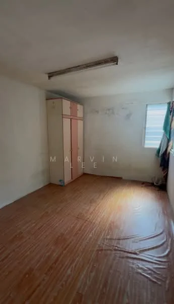 Room features: white painted walls, wooden flooring, single window, built-in wardrobe with pink accents, ceiling light fixture, no visible decor.