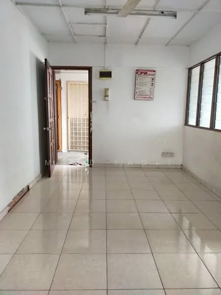 Room features: white painted walls, tile flooring, ceiling with exposed beams, single wooden door, multiple windows with grid pattern, light switch on wall, air conditioning unit on wall, wall-mounted notice board; style: minimalist.