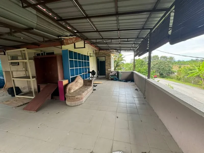 Room features: roofed terrace, grey tiled flooring, metal roof, exposed beams, built-in shelving unit, sofa, office chair, wooden ramp, view of greenery, open space, natural light; view: garden.
