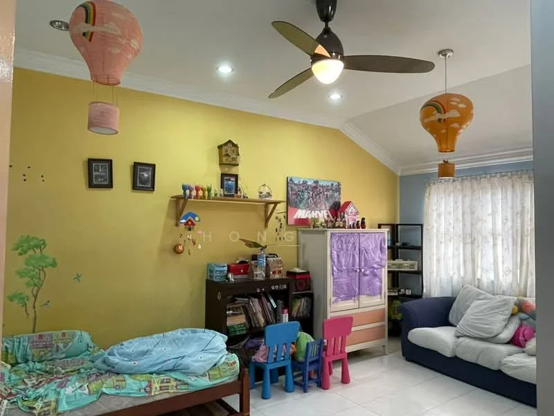 Living features: yellow painted walls, white ceiling with recessed downlights, 5-blade ceiling fan, sofa in light grey fabric, colorful children's chairs, wooden shelving unit, decorative wall art, curtains with floral pattern, play area with bedding, colorful paper lanterns; style: modern.