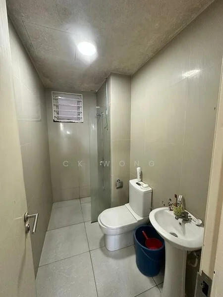 Bathroom features: white tiled walls, grey tiled flooring, walk-in shower with glass enclosure, chrome basin mixer faucet, one-piece toilet, pedestal sink, ceiling light, window for natural light, bucket, cleaning supplies; style: modern.