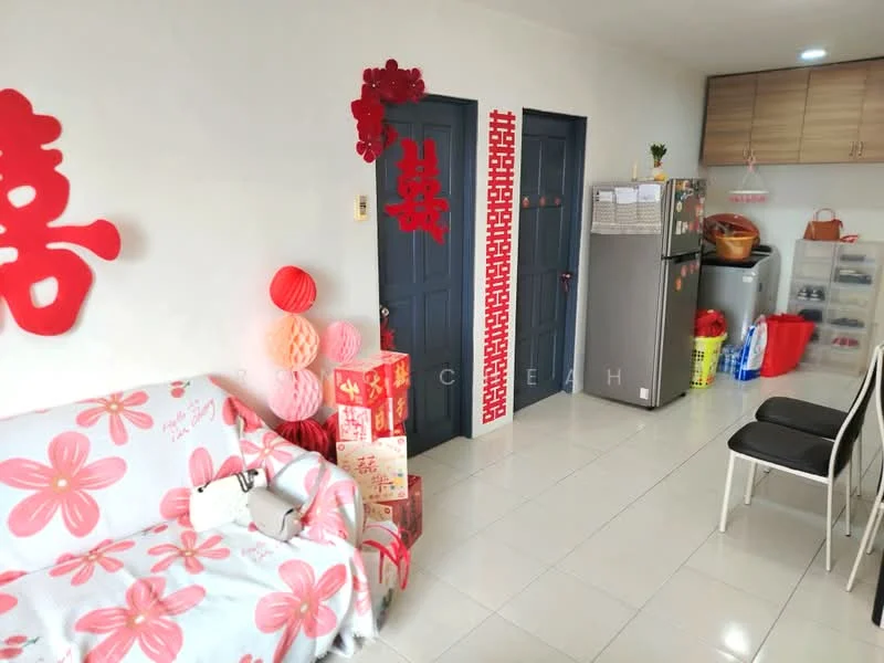 Living features: floral-patterned fabric sofa, white walls, glossy tile flooring, refrigerator, wood cabinetry, plastic storage containers, decorative red wall hangings, two doors, dining chairs, decorative paper lanterns; style: modern.