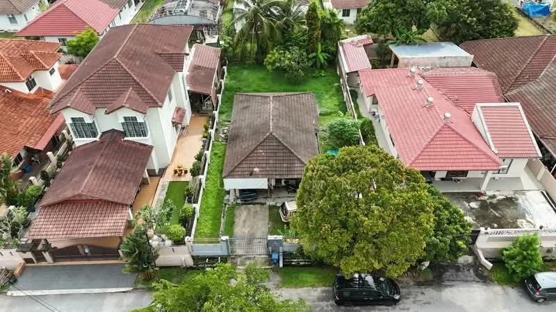 Exterior type: linked terrace house; features: red tiled roofs, manicured lawn, mature trees, paved driveway, surrounded by greenery, two-storey houses, single-storey house, fenced perimeter; style: modern.