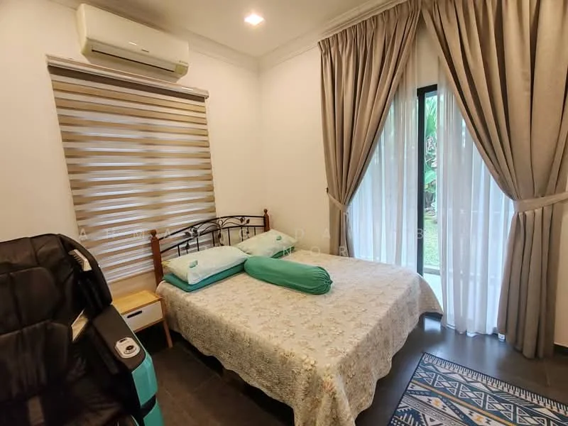 Bedroom features: queen-size bed with white lace bedspread, two teal accent pillows, wooden bed frame, black leather massage chair, nightstand with drawer, floor-to-ceiling sliding glass door, sheer curtains, blackout curtains, wall-mounted split AC unit, decorative area rug with geometric pattern, wooden flooring; style: modern; view: garden.